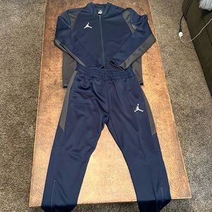 Medium Jordan jumpsuit tracksuit in new condition.